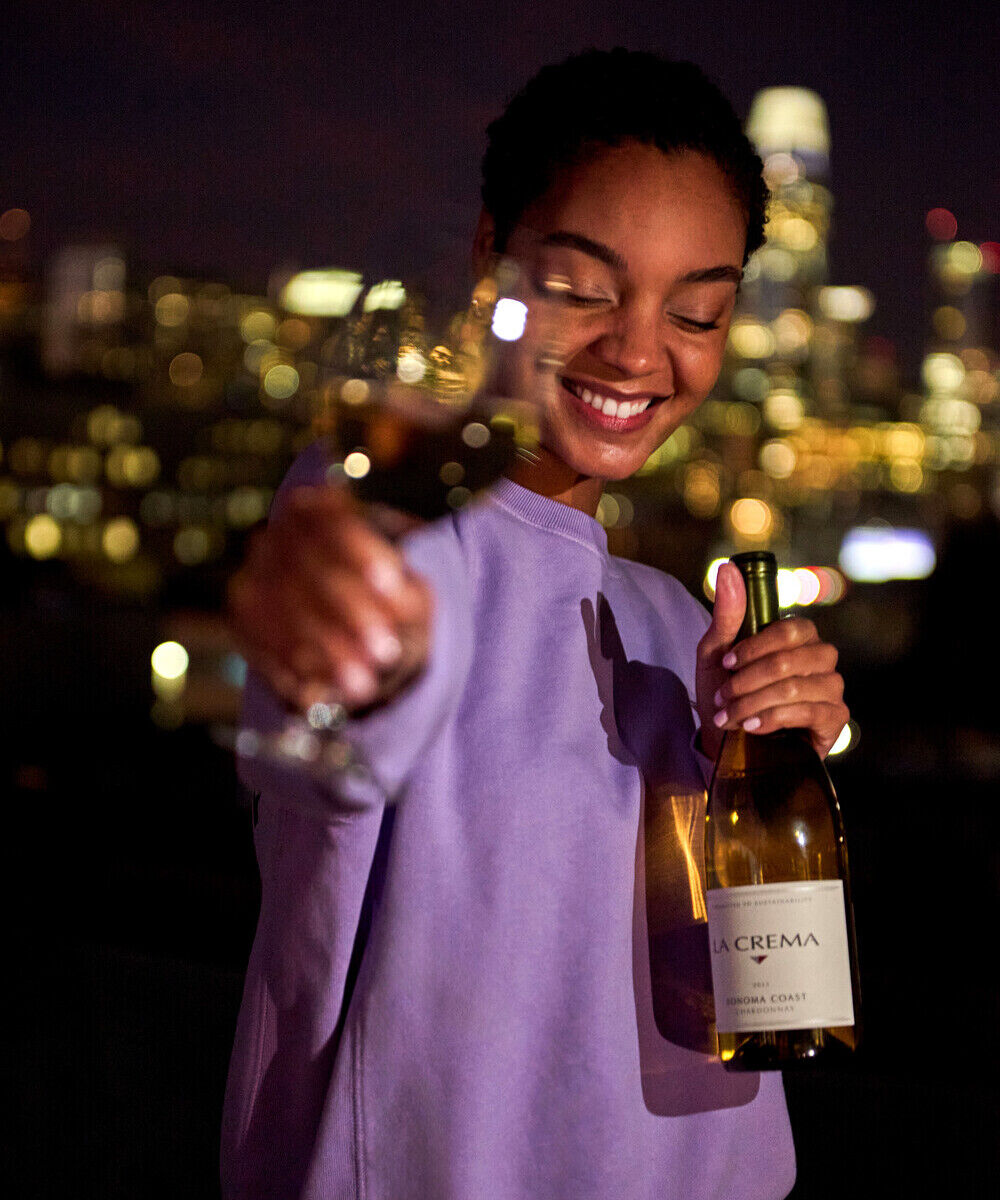 A women drinking La Crema wine